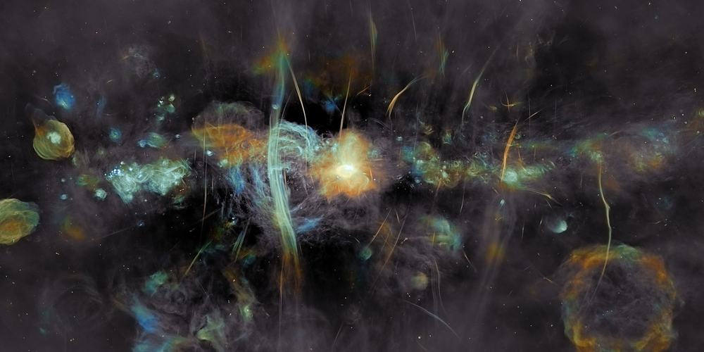 Glowing gas clouds and dust in dark space